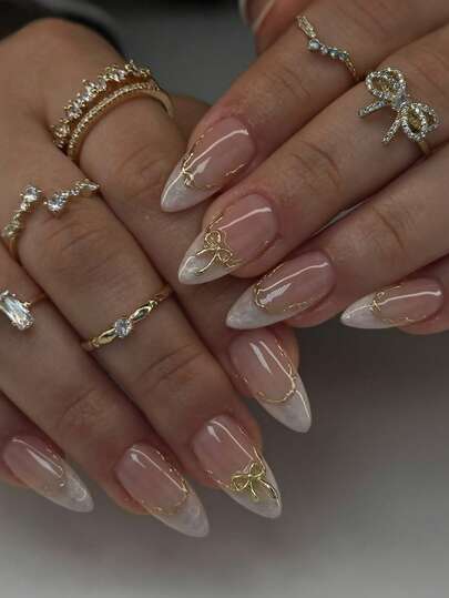 Gradient Gold Bow Almond French Nails - view 1